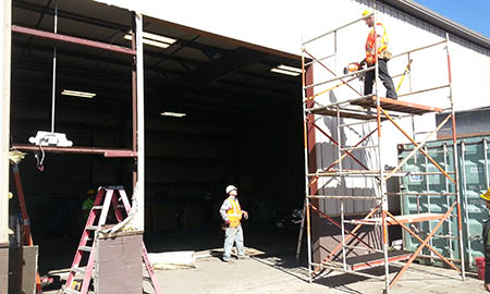 Large Commercial Door Cut Out in Warehouse