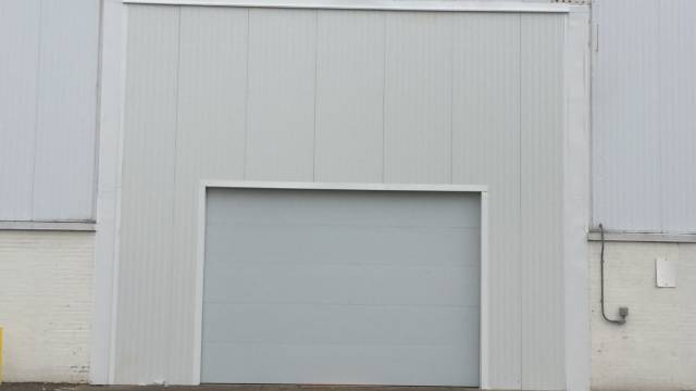 Finished warehouse door retrofit