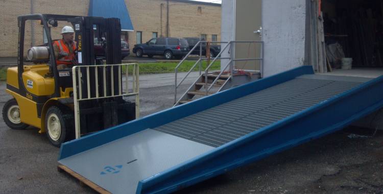 Moving a metal commercial ramp into final position